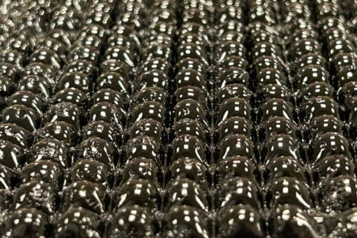 Caption:A close-up of a new origami-inspired hydrogel material, designed by MIT engineers, that swells to absorb water from the air. When water condenses out of the material to be collected, the individual hydrogel spheres shrink back down to capture more moisture.
Credits:Credit: Courtesy of the researchers
